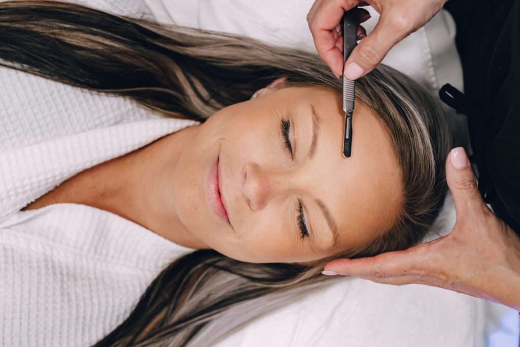 Woman receiving a facial treatment at med spa that offers med spa services